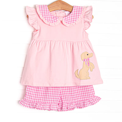  This set features a flutter sleeve pink top with a puppy applique and a pink gingham peter pan collar. Coordinating pink gingham ruffle shorts to match. 