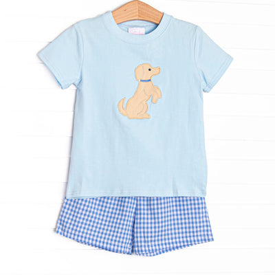 This set features a short sleeve blue top with a puppy applique and blue gingham shorts to match.