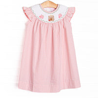  This dress features a pink gingham print, flutter sleeves, and castle smockings. This dress is too sweet for the summer!

SIZE GUIDE 