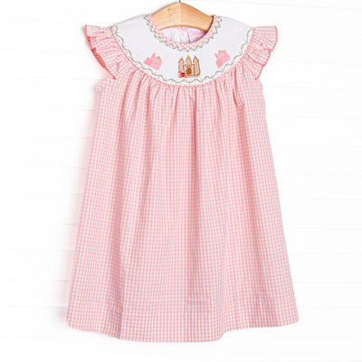  This dress features a pink gingham print, flutter sleeves, and castle smockings. This dress is too sweet for the summer!

SIZE GUIDE 