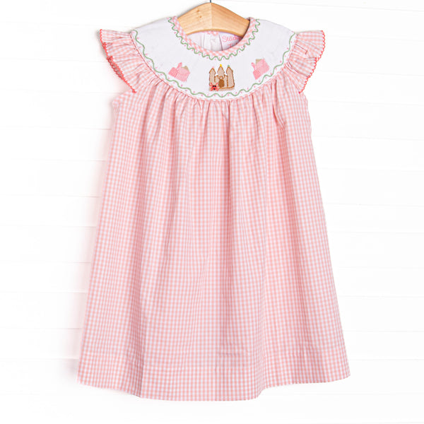  This dress features a pink gingham print, flutter sleeves, and castle smockings. This dress is too sweet for the summer!

SIZE GUIDE 