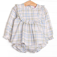 This set features sage and blue plaid fabric, ruffle chest trim, and long sleeves. Coordinating plaid diaper cover to match.