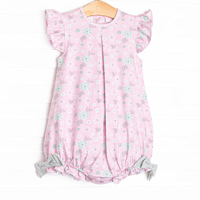  This bubble features a pink floral, flutter sleeves, and green gingham bow details. 