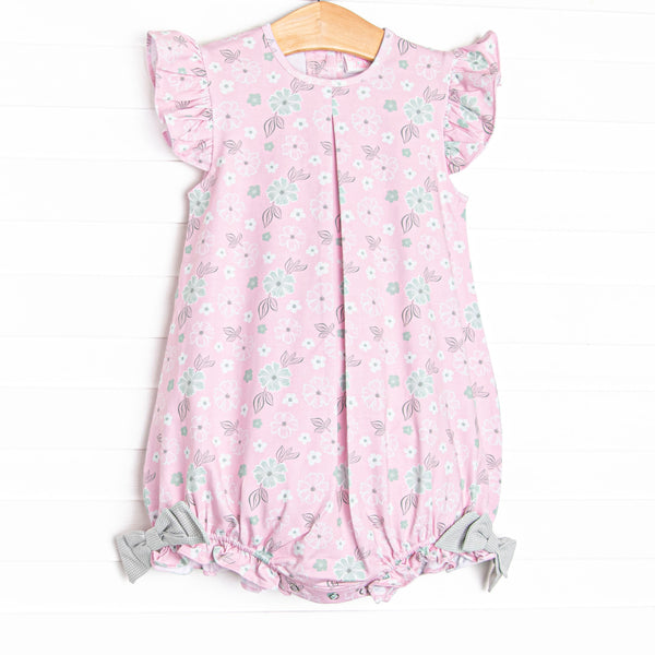  This bubble features a pink floral, flutter sleeves, and green gingham bow details. 
