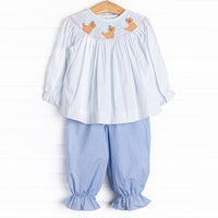 This set features a blue bitty dot top with a trio of puppies smocking, and blue gingham bloomer pants to match.