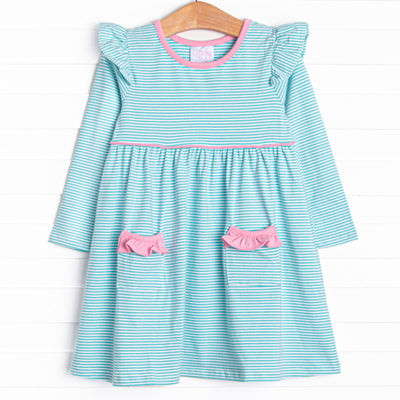  The dress features front ruffle pockets, mint stripes, and the softest knit material. 