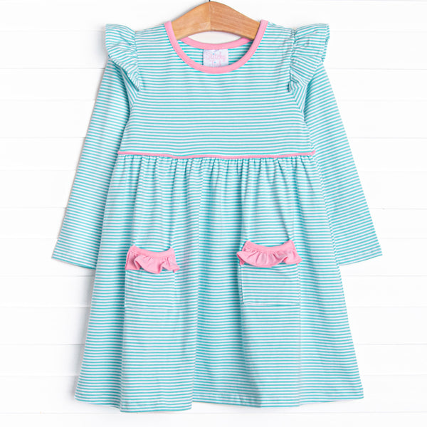  The dress features front ruffle pockets, mint stripes, and the softest knit material. 