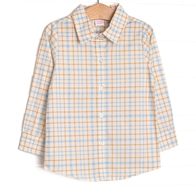  This top features a blue plaid print, a polo collar, and a button down front. 