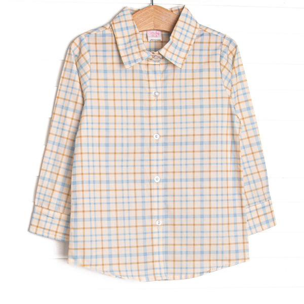  This top features a blue plaid print, a polo collar, and a button down front. 