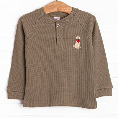 This top features a green waffle knit material, front buttons, and a dog embroidery.