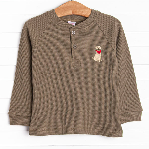 This top features a green waffle knit material, front buttons, and a dog embroidery.