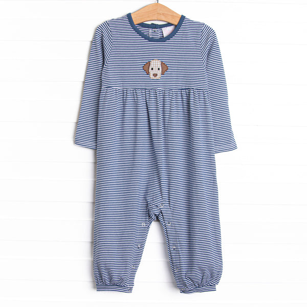  This romper features a navy blue striped material, a puppy applique and snaps on the stride. 