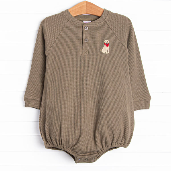 This bubble features a green waffle knit material, front buttons, and a dog embroidery.