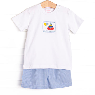 This set features a short sleeve top with a steamboat smocking and blue gingham shorts to match.