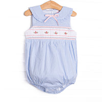 This bubble featurse a blue check print, a dainty pink bow, and a rose smocking.