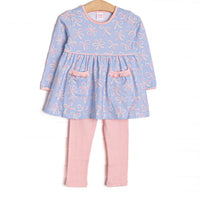  This set features a bow print, pink picot trim, and front ruffle pockets. Coordinating pink leggings to match. 