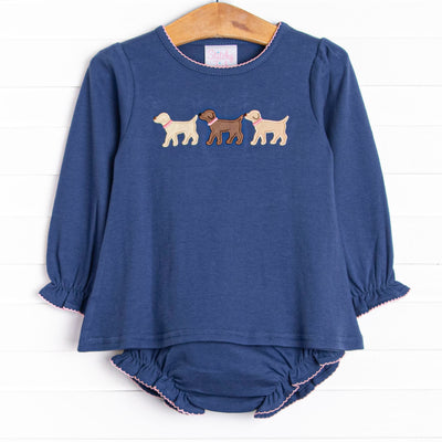 This set features a navy blue knit material, pink ric rac trim, and puppy appliques.