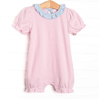 The romper features sweet pink stripes, extremely soft Pima cotton, and puff sleeves.