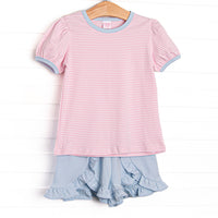 The set features our incredibly soft pima cotton, pink striped puff sleeve top, and blue ruffle shorts.