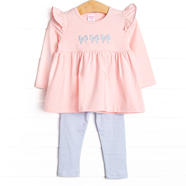  This set features a pink material, a trio of blue bow embroidery, and blue striped leggings to match. 