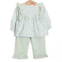 This set features a green floral print, green ruffle trim, and green bows. Coordinating green ruffle pants to match.