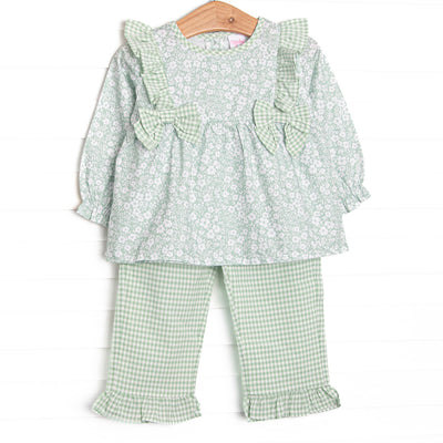 This set features a green floral print, green ruffle trim, and green bows. Coordinating green ruffle pants to match.