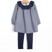  This set features a navy blue gingham top and a scalloped navy blue ruffle collar. Coordinating navy blue leggings to match. 
