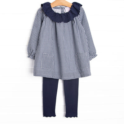  This set features a navy blue gingham top and a scalloped navy blue ruffle collar. Coordinating navy blue leggings to match. 
