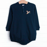  This bubble features a navy blue waffle knit material, front buttons, and a mallard embroidery. 