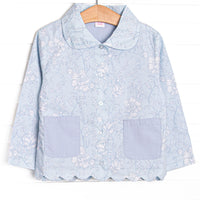  This coat features a blue floral material, a peter pan collar and trim, and scalloped trim. 