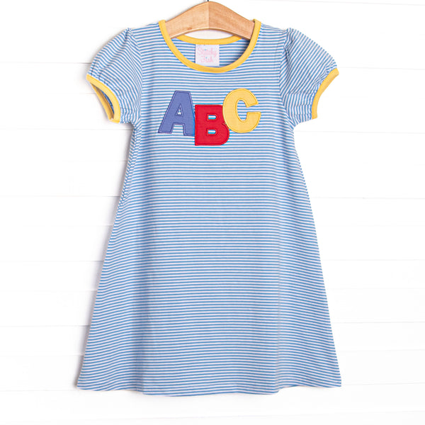 This dress features a blue stripe pattern, yellow trim, and ABC applique.