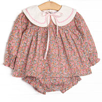  This set features a pink floral print, a cream collar, and a satin bow. Coordinating diaper cover to match. 