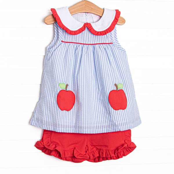This set features a blue seersucker print, a peter pan collar with red ruffles, and an apple applique. Coordinating red ruffle shorts.