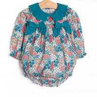 This bubble features blue floral print, blue corduroy side ties, and a blue corduroy scalloped collar.