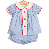This set features blue gingham material, puff sleeves, and abc and apple embroidery.