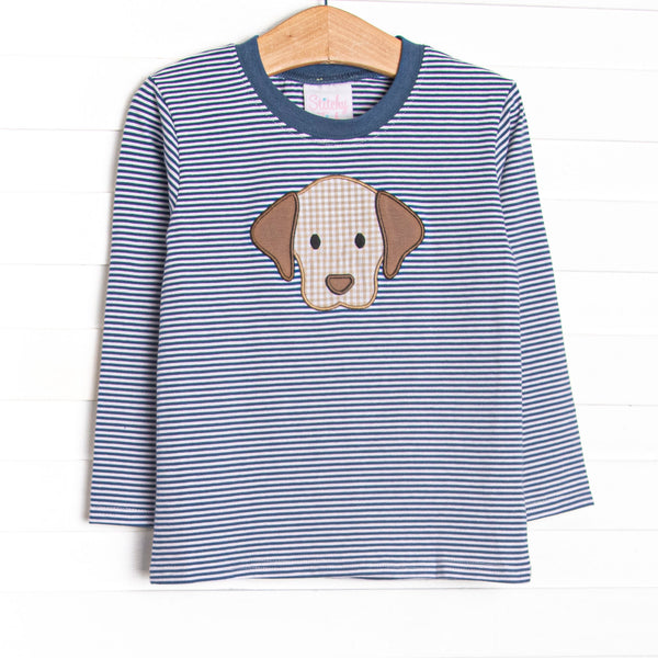  This top features a navy blue striped material, a puppy applique, and long sleeves. 