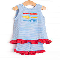  This set features a blue striped print, red ruffle trim, and multicolored crayon applique. Matching ruffle short to complete the set. 