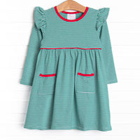  The dress features green stripes, red ruffle trim, and soft knit material. 