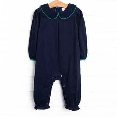  This romper features a blue corduroy material, a peter pan collar, and green trim. 