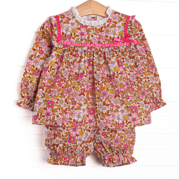  This set features a fall floral print, ruffle trim, and red ribbon. Matching floral bloomer shorts to complete the set. 