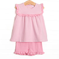  The set features precious ruffle trim, sweet pink stripes, and breathable knit material. 