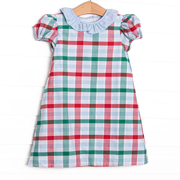 This dress features a blue, green, and red plaid print, a peter pan collar, and puff sleeves.