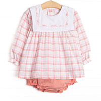  This set features pink plaid fabric, a white bib collar, and pink plaid trim. Coordinating pink diaper cover to match. 