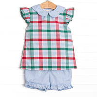  This set features a blue, green, and red plaid print, a peter pan collar, and flutter sleeves. Coordinating blue ruffle shorts to match. 