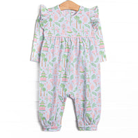  This romper features a mahjong inspired print, ruffle trim, and snaps on the stride. 