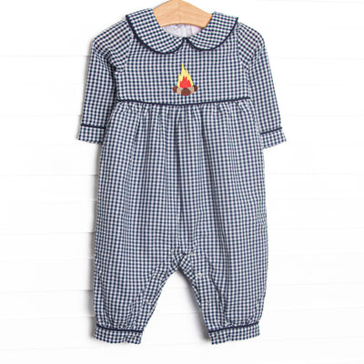  This romper features a navy blue gingham print, a peter pan collar, and a camp inspired applique. 