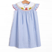 This dress features a blue striped material, schoolhouse smocking, flutter sleeves, and red picot trim.