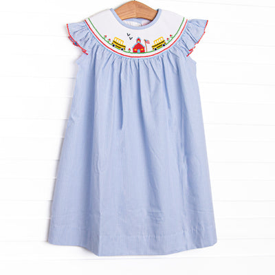 This dress features a blue striped material, schoolhouse smocking, flutter sleeves, and red picot trim.