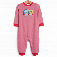 This romper features a red striped print, snaps on the stride, and a dump truck applique. 