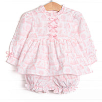  This set features a pink dainty unicorn print, a trio of pink satin bows, and ruffle trim. Matching bloomer shorts to complete the set. 